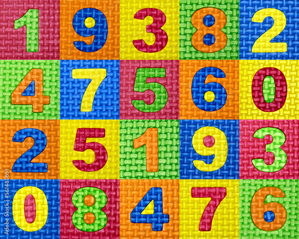 A pattern of numbers of different colors in multi-colored square cells. Arabic numerals close-up. Mathematical mosaic carpet A pattern of numbers of different colors in multi-colored square cells. Arabic numerals close-up. Mathematical mosaic carpet