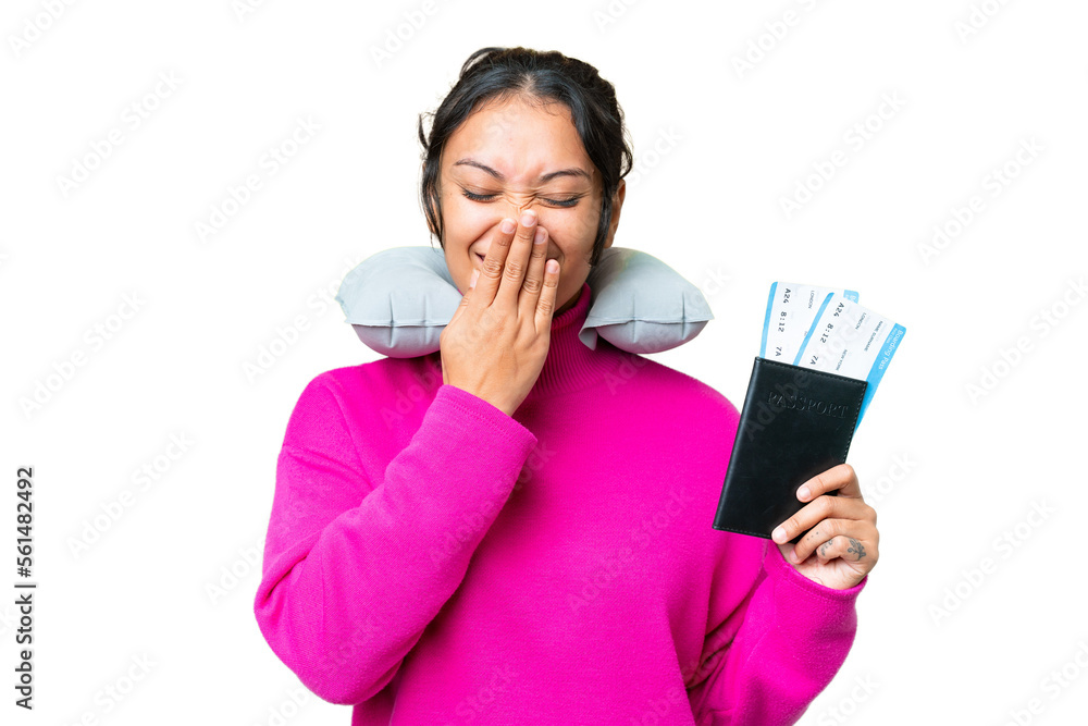 Young Uruguayan woman holding a passport over isolated chroma key background happy and smiling covering mouth with hand Young Uruguayan woman holding a passport over isolated chroma key background happy and smiling covering mouth with hand