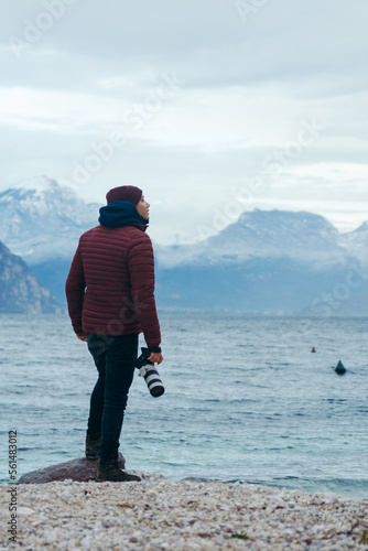 A photographer looks around the vicinity of Lake Garda