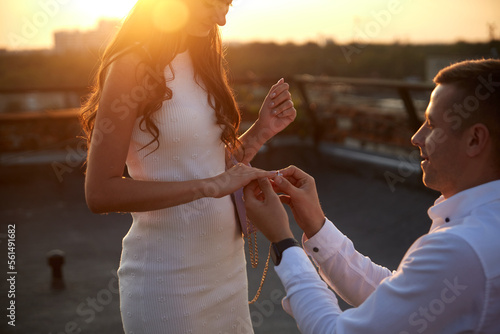 Fotografia Young couple is getting engaged, man propose woman, new family celebration, enga