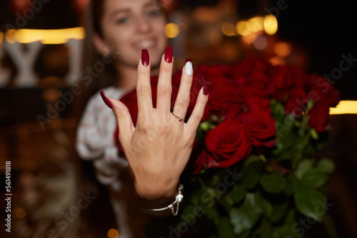 Happy Woman Shows Engagement Ring After Proposal