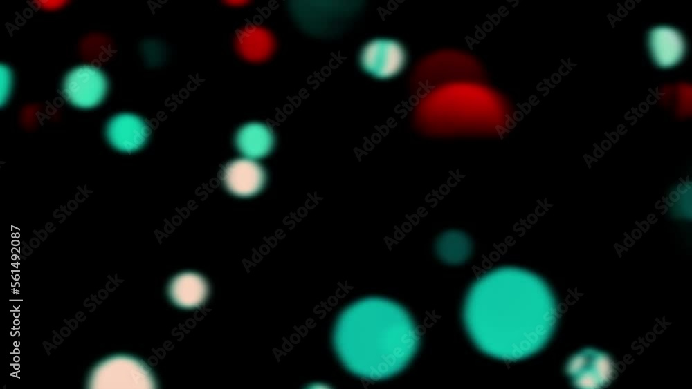 Bokeh of flashing colored lights of a Christmas garland on a dark background. Bokeh of flashing colored lights of a Christmas garland on a dark background.