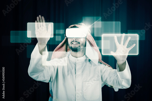 Photography Beraded Arab man enjoying virtual reality glasses in modern design