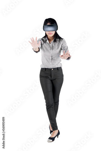 Young Asian woman in virtual reality glasses © Creativa Images