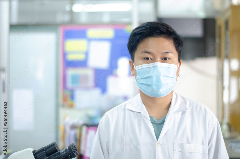 Asian scientists working in laboratory. Asian scientists working in laboratory.