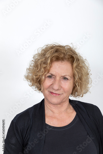 attractive laughing mature woman with curly hair