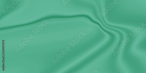 Green silk background . Green fabric and satin silk background texture . abstract background luxury cloth or liquid wave or wavy folds of grunge silk texture material or smooth luxurious .