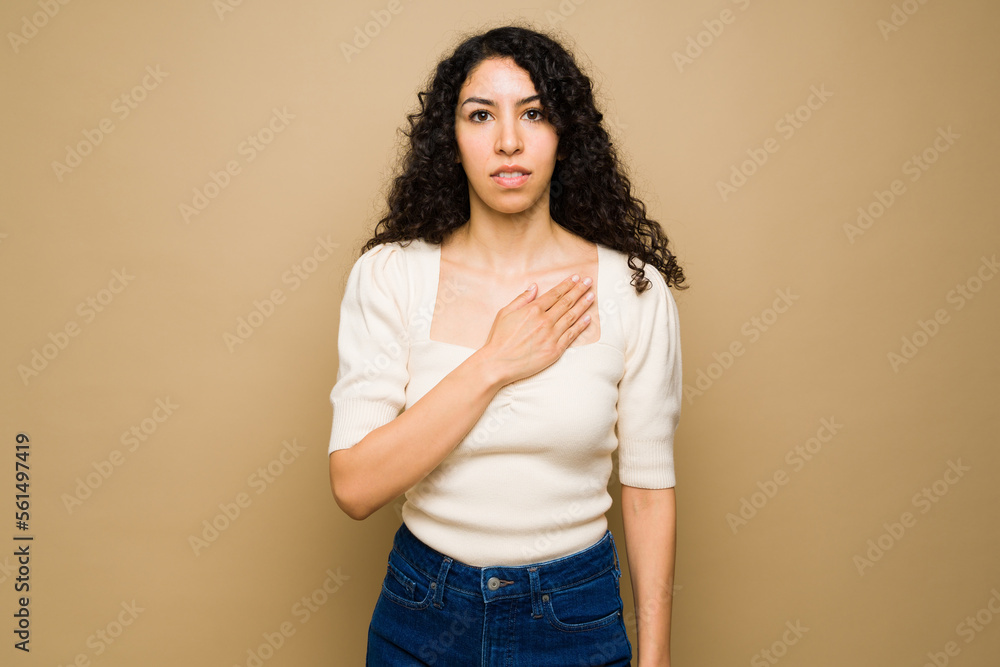 Young woman using sign language saying please Young woman using sign language saying please