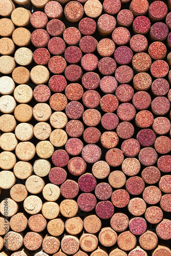Collection of wine cork from white and red wine, natural texture bottle stoppers top view, colorful background from closeup wooden corks. Natural textured stoppers Winery, winemaking concept