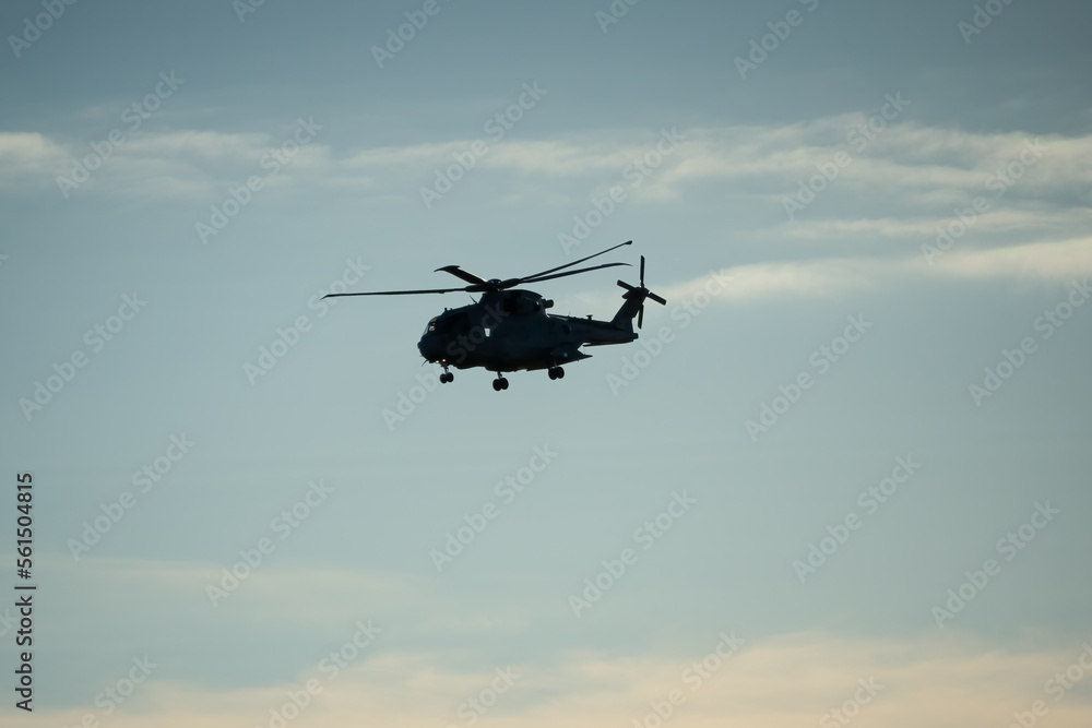 silhouette of British Joint Helicopter Command (JHC) Royal Air Force Puma HC2 on a military exercise, winter sky, Wiltshire UK silhouette of British Joint Helicopter Command (JHC) Royal Air Force Puma HC2 on a military exercise, winter sky, Wiltshire UK