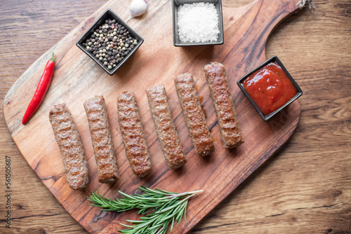 Grilled kebab with spices on a rustic background