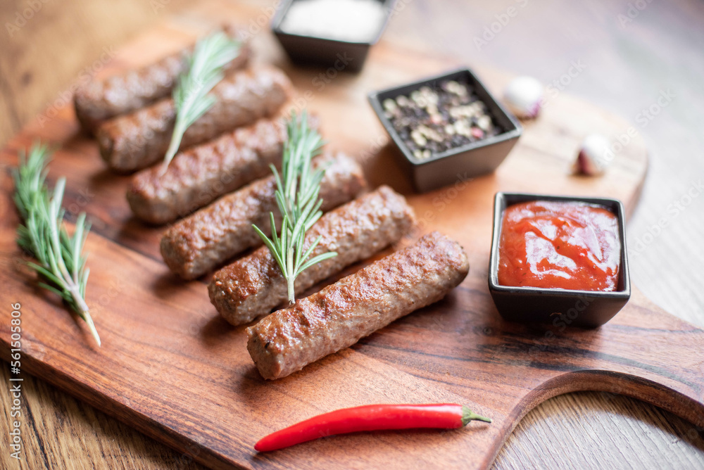 Grilled kebab with spices on a rustic background Grilled kebab with spices on a rustic background