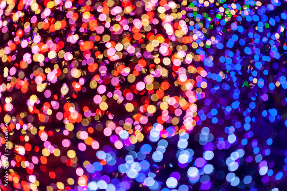 Naklejka premium Closeup shot of pink and purple bokeh lights isolated on black background