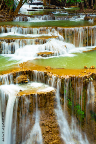 Amazing colorful waterfall in national park forest during spring beautiful deep forest in Thailand technic long exposure  during vacation and relax time.