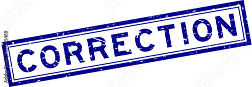 Grunge blue correction word square rubber seal stamp on white background