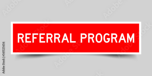 Square label banner with word referral program in red color on gray background