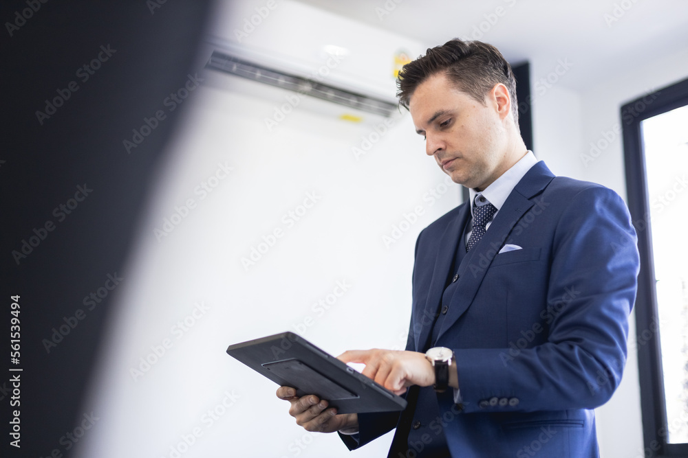 businessman using digital tablet in office, touchpad connection device online communication. businessman using digital tablet in office, touchpad connection device online communication.