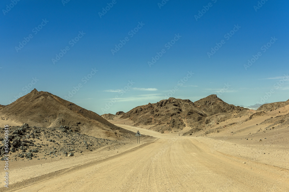 sand road through the moon landscape landscape near Swakopmund, Namibia sand road through the moon landscape landscape near Swakopmund, Namibia