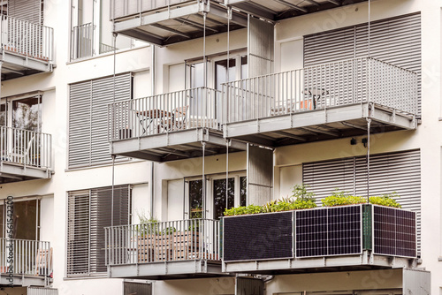 Solar Panel on Balcony of Modern Residential Building in Germany. Modern Facade Apartment Building with Solar panels on Flat Balcony. © Maryana