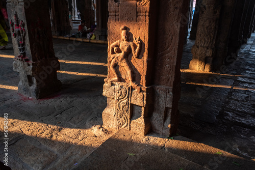 Beautiful carving of a dancing figurine on a pillar at the ancient Hindu temple of Srirangam.