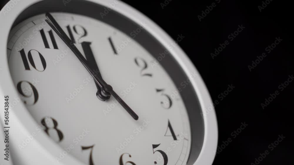 White clock on black background. Doomsday clock. White clock on black background. Doomsday clock.