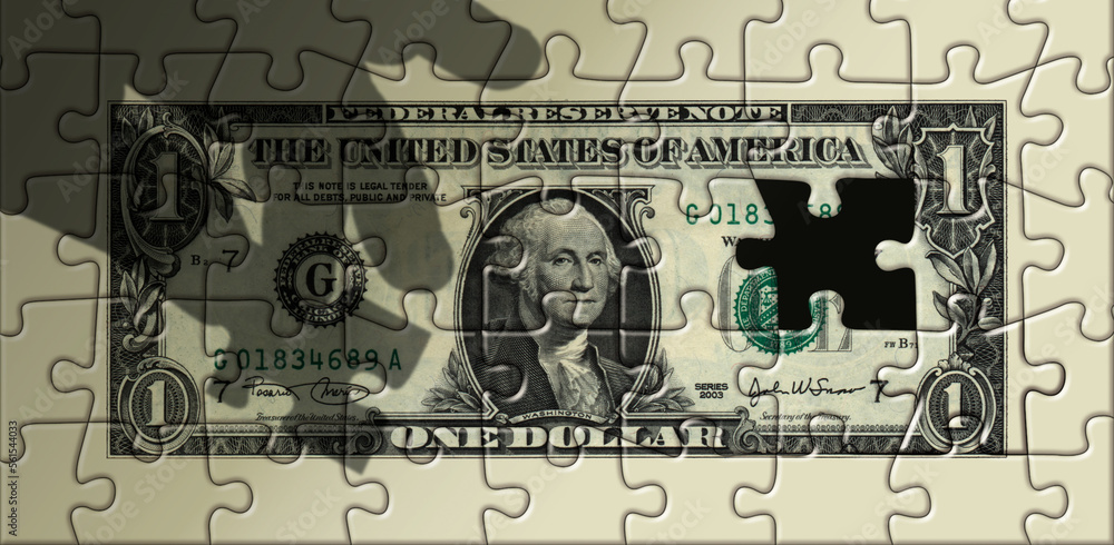 Dollar Puzzle with last pice being added.