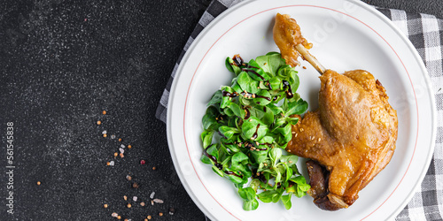 duck leg confit second course healthy meal food snack on the table copy space food background rustic top view photo