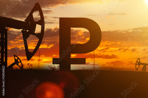 Sing ruble and oil sign against backdrop of beautiful sunset. Purchase and sale of crude oil for ruble.