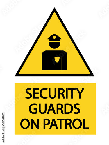 Security guards on patrol,  warning yellow triangle sign with symbol and text below.