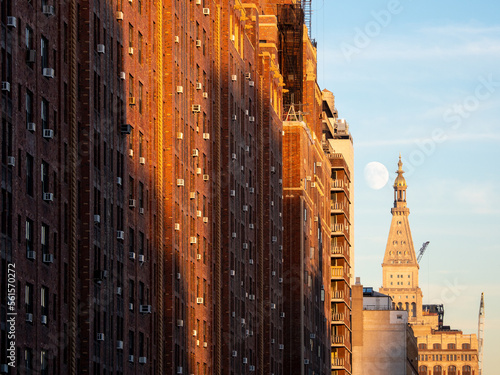 Manhattan and moon at 23rd street, USA.