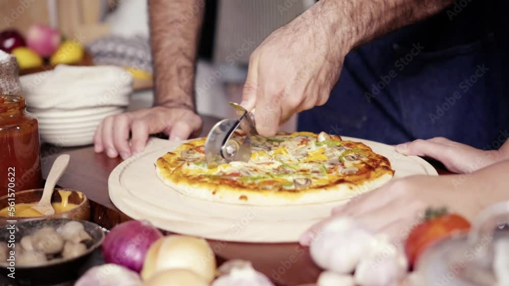 Homemade pizza on wooden table, fast food cooking in the kitchen at home. Homemade pizza on wooden table, fast food cooking in the kitchen at home.