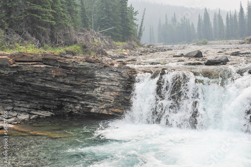 Sheep River waterfall in the woods of the rocky mountains of Alberta, Canada
