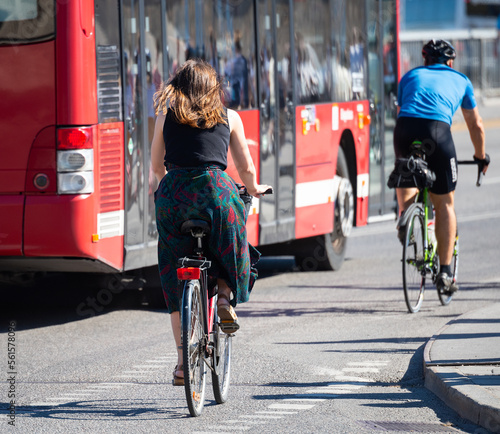 Photography Bicyclists commuting in summer Stockholm traffic