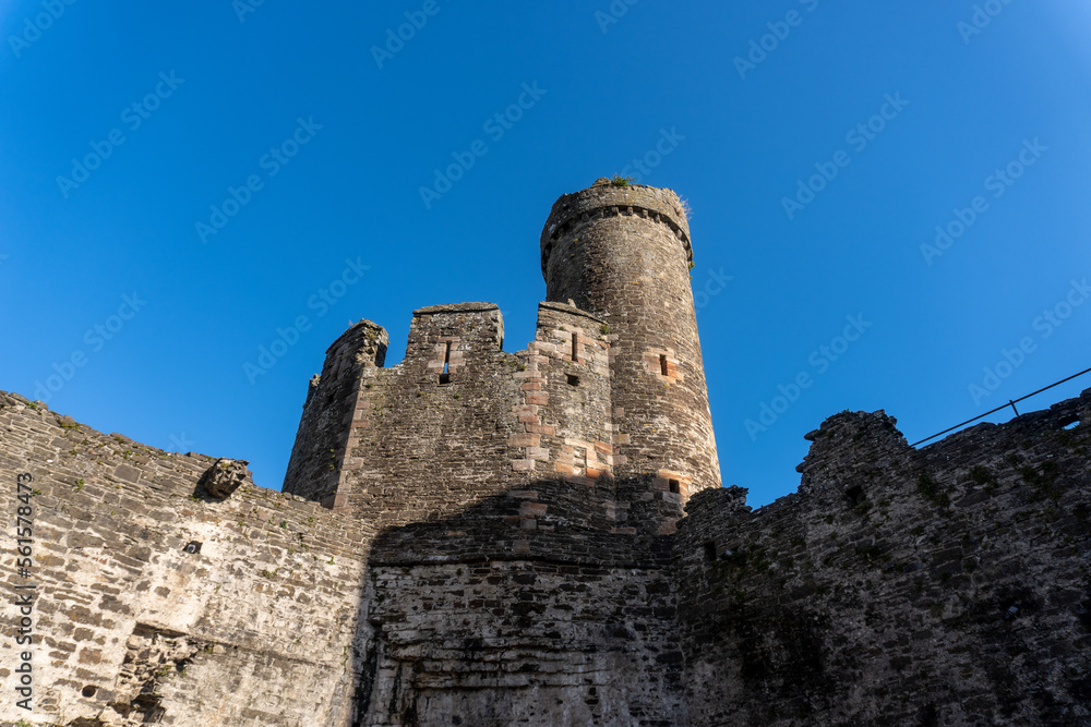 Conwy, North Wales, United Kingdom -2023: Conwy Castle fortification built by Edward I, during his conquest of Wales. Prison tower and crenelated walls. 