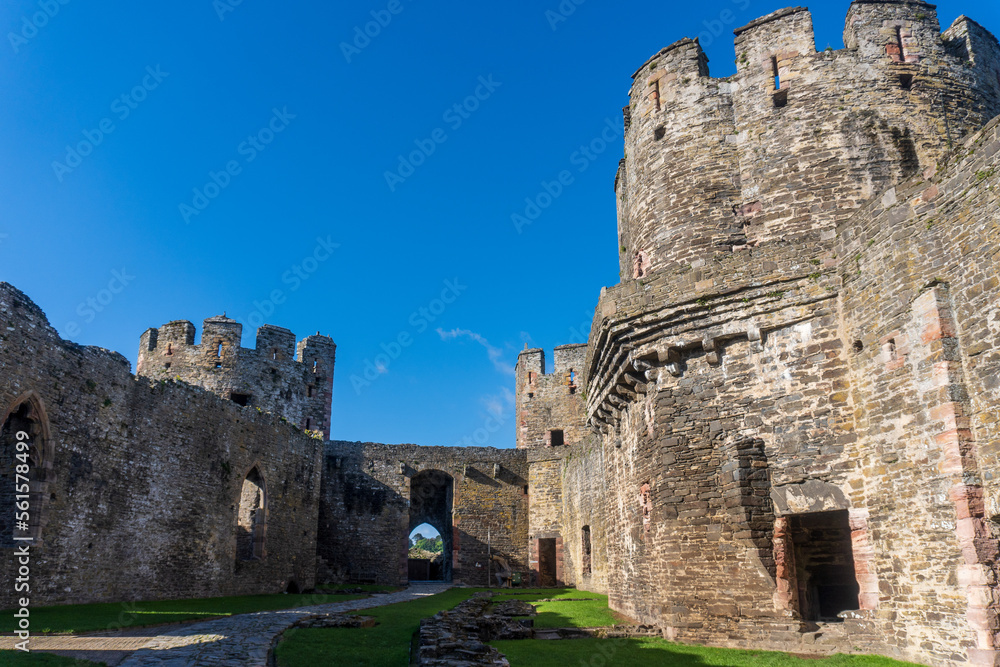 Conwy, North Wales, United Kingdom: Conwy Castle fortification built by Edward I, during his conquest of Wales. Outer Ward, Site of Kitchen and Stables. Ancient stone walls and towers. 