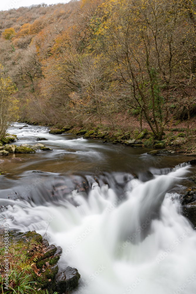 Long exposure of the Watersmeet Bridge waterfall at Watersmeet in Exmoor National Park Long exposure of the Watersmeet Bridge waterfall at Watersmeet in Exmoor National Park