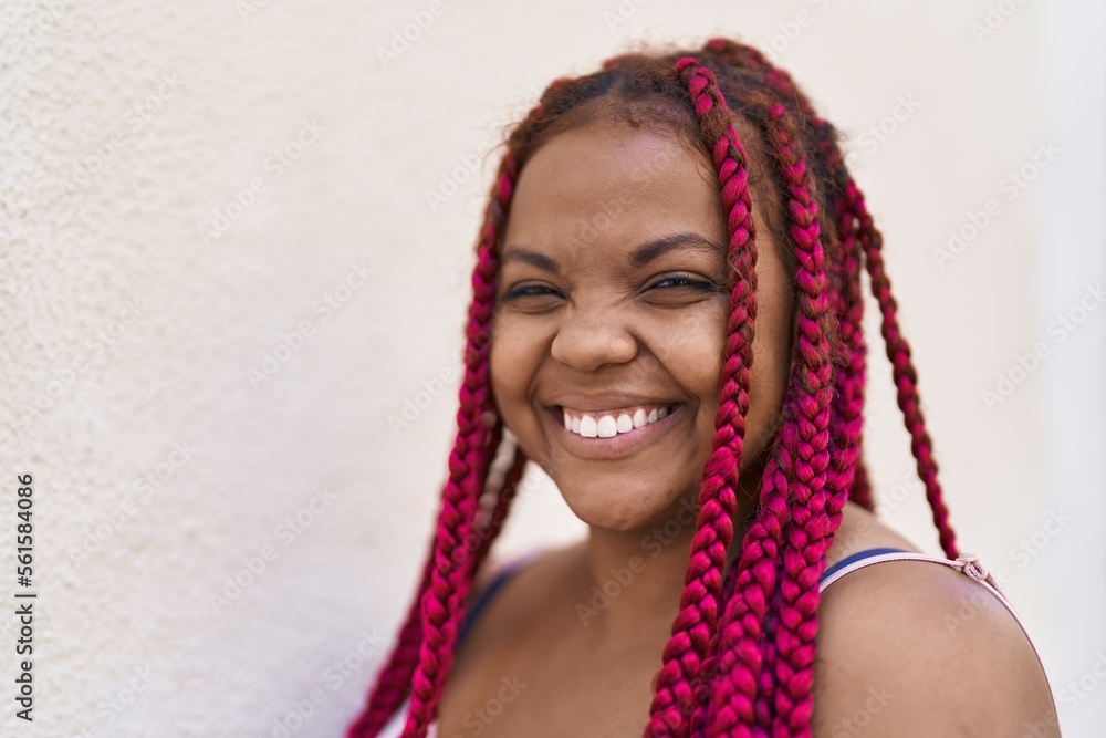 African american woman smiling confident looking to the side at street African american woman smiling confident looking to the side at street