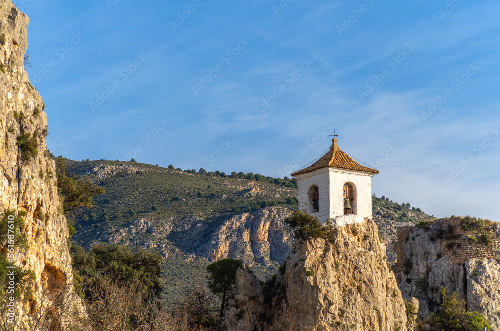 Picturesque tower bell on the top of a rock, in Guadalest (Alicante Spain).