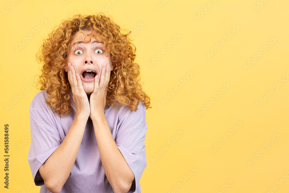 Woman with the hands on the face expressing dismay Woman with the hands on the face expressing dismay