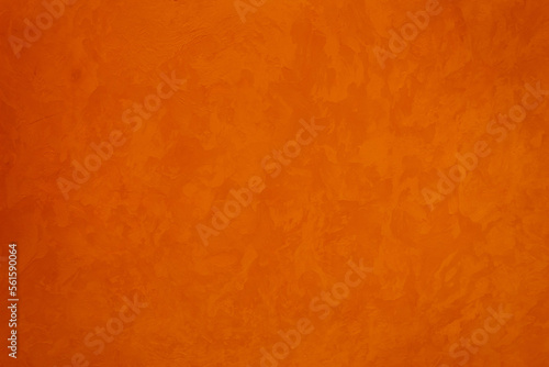 Bright orange decorative plaster Wall Background.