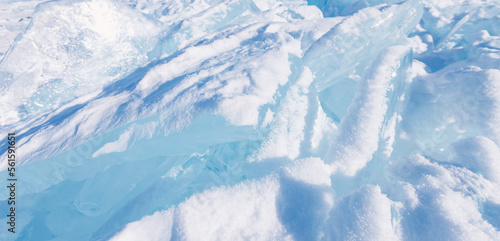 Frozen ice hummocks Winter landscape of Lake Baikal sunny day