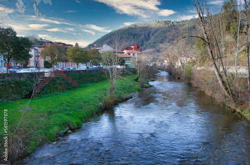 Piloña river running through Infiesto village, Piloña, Asturias, Spain photo