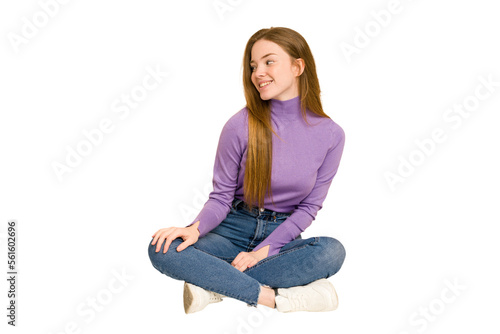 Young redhead woman sitting on the floor cut out isolated sad, serious face, feeling miserable and displeased.
