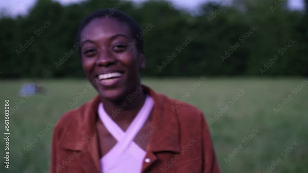 Young woman with short hair avoiding the camera for being too shy. shyness, lifestyle and freedom concept Young woman with short hair avoiding the camera for being too shy. shyness, lifestyle and freedom concept