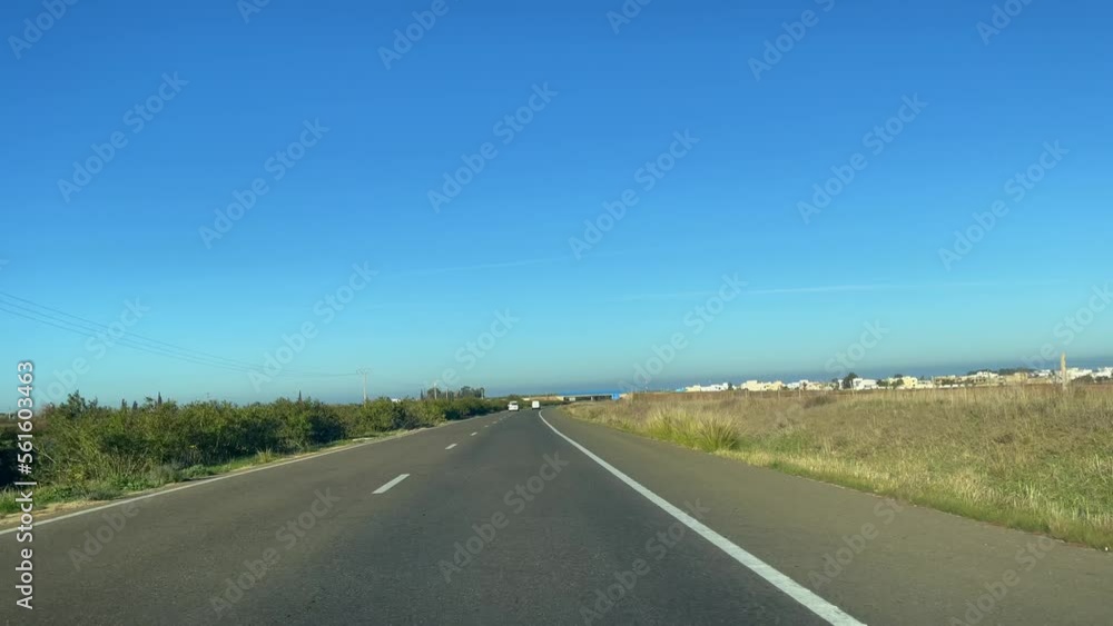 Dashcam view of a car driving on the highway in Morocco Dashcam view of a car driving on the highway in Morocco