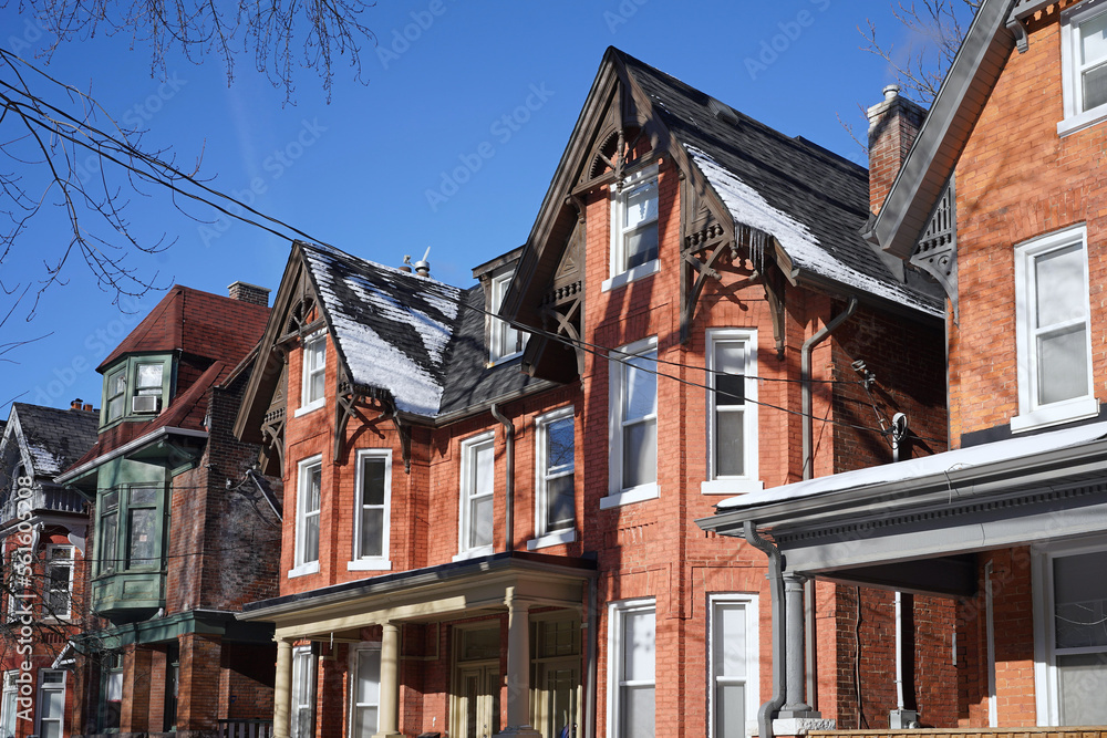 Fototapeta premium row of old semi-detached houses with gables