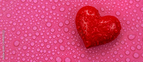 Wet heart background valentine. Selective focus. Red.