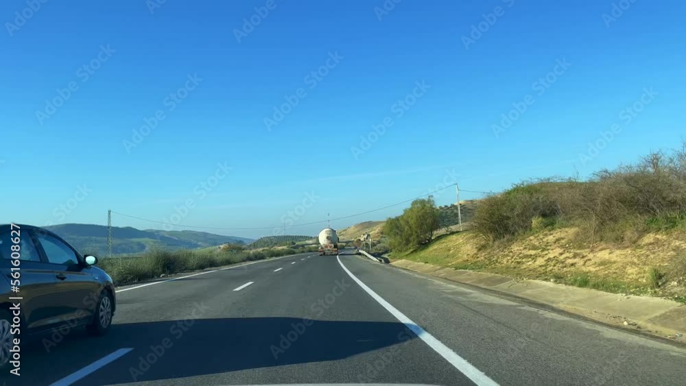 Dashcam view of a car driving on the highway in Morocco Dashcam view of a car driving on the highway in Morocco