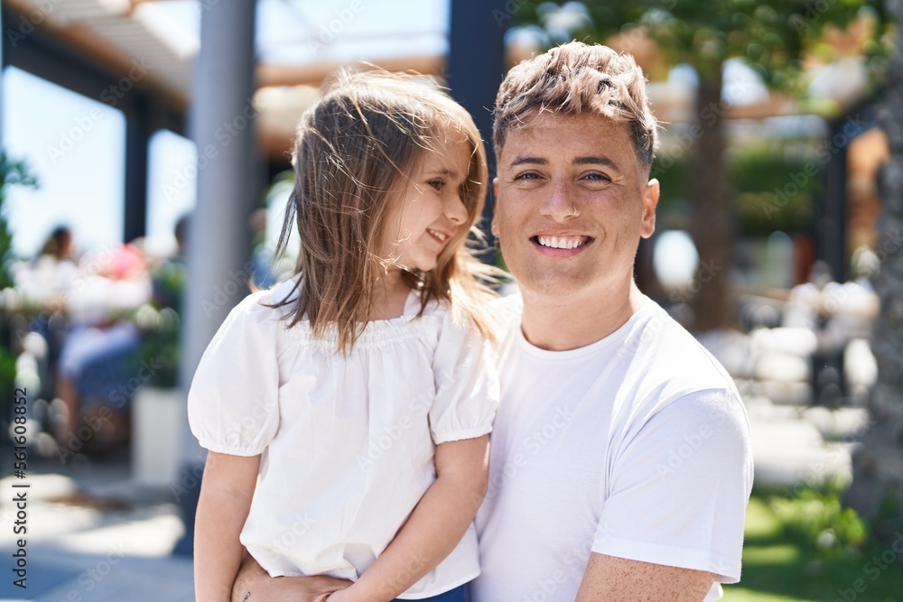 Father and daughter smiling confident standing together at street Father and daughter smiling confident standing together at street