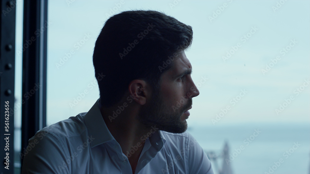 Attractive man relaxing panoramic bar portrait. Pensive male face expression Attractive man relaxing panoramic bar portrait. Pensive male face expression